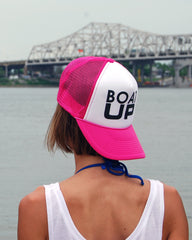 pink boat up trucker hat